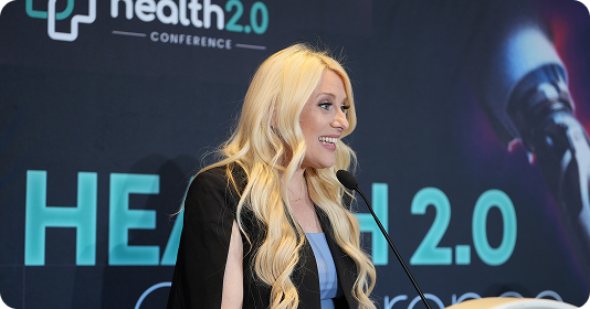 Speaker sharing healthcare insights at the conference